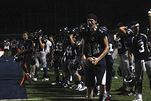 The football team gets excited as they play Fort Zumwalt East on Aug. 22. They ended up losing the game 35-7.