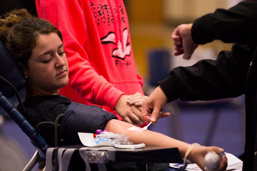 A+student+has+blood+drawn+on++Tuesday%2C+Oct.+28%2C+for+the+annual+blood+drive.+The+blood+drive+was+held+in+the+small+gym+on+Oct.+28+and+was+sponsored+by+StuCo.