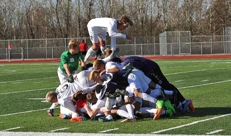 At the final buzzer, the mens soccer team piles on top of one another after defeating Marquette 2-1 to punch their ticket to the final four. The team will battle Lees Summit this Friday at 6 p.m. - who they beat earlier in the season - for a spot in the title game on Saturday.