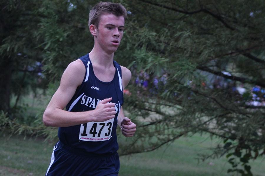 Junior Zach Painter paces himself at the McNair Park run.