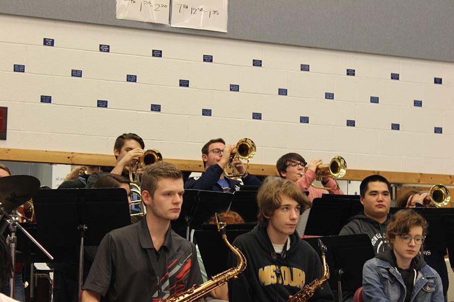 Band students, including senior Jared Tredway (second row, on right), practice during class.