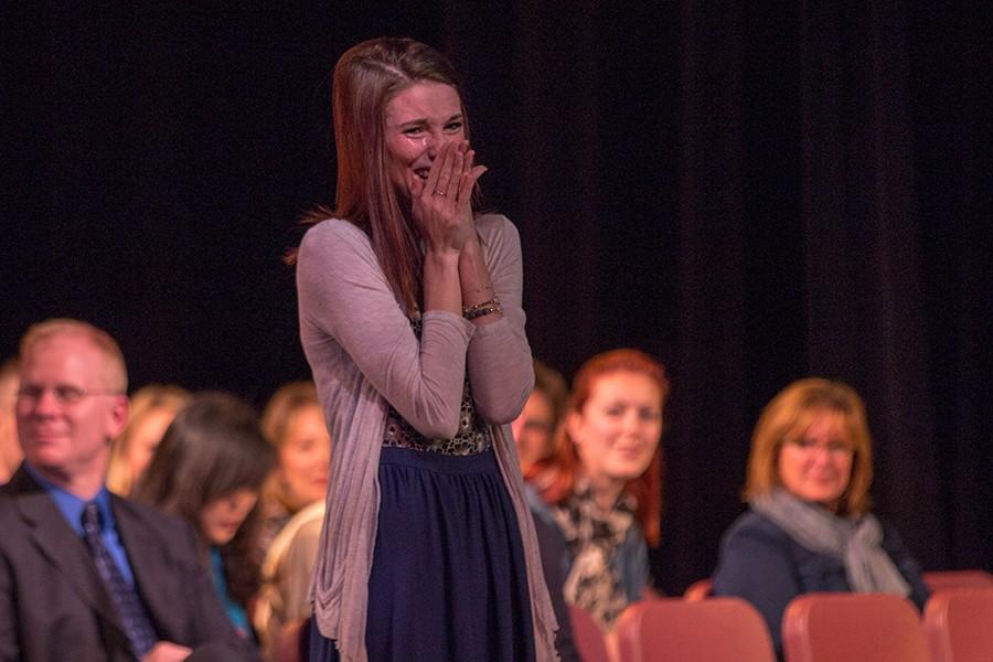 Senior Abby Dwyer tears up as she hears the kind words written about her by history teacher Mr. Donald Lober.
