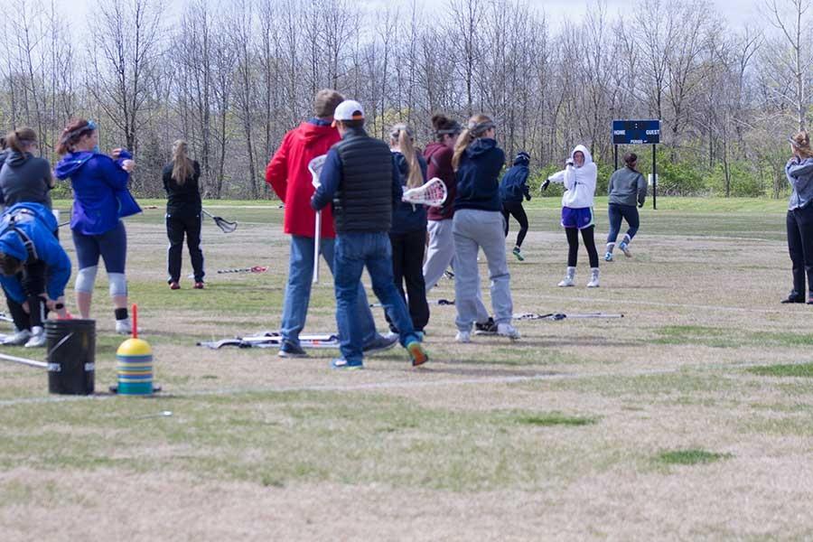 Lacrosse team prepares for  the next game at practice.