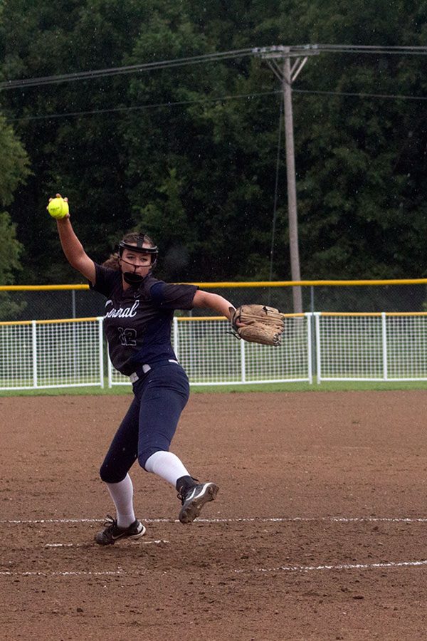 Lindsey Powell pitches the ball. 