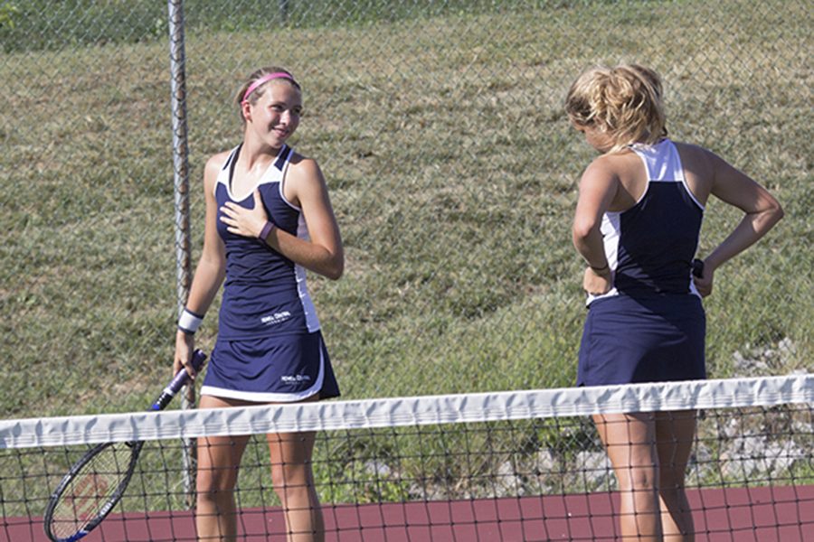 Senior Angel Ikeda and Freshman Mckenzie Jones share a laugh after a point was won on Saturday, September 24th at GACs