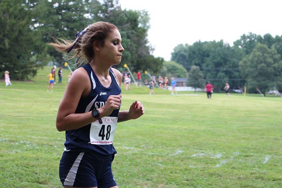 Lauren Coleman a varsity member of the cross country team is running at Quail Trail. The meet was hotter than expected.