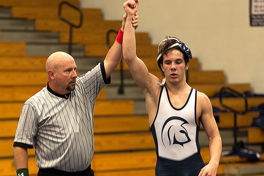 Sophomore varsity wrestler Andrew Godier defeats his Fort Zumwalt South opponent on January 18. Unfortunately, FHCs team was defeated overall.