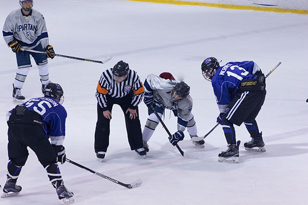 Spartans at the puck off. They won 8-6 against Holt on Tuesday night.