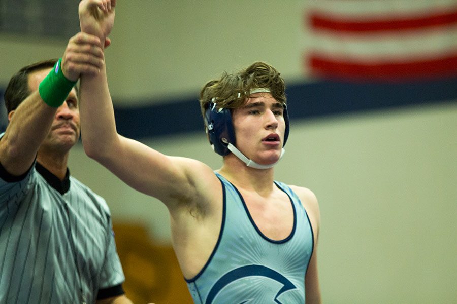 Devin+Schwartzkopf+winning+in+his+match+against+Troy+on+Jan.+11.+He+hopes+to+win+a+State+title+coming+up+in+mid-February.+