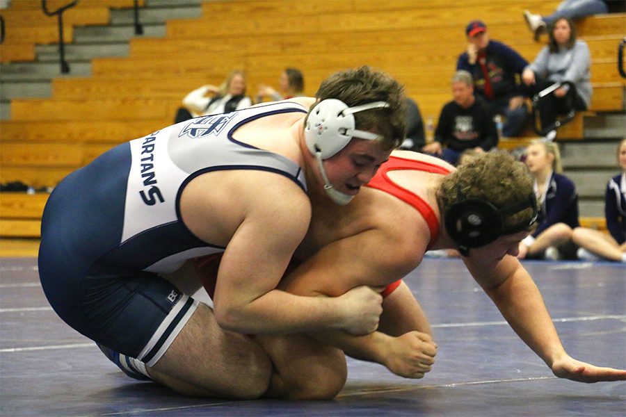 Senior, Jackson Berck, pins Fort Zumwalt South opponent on Jan. 18. “I’m very focused. I take every drill, every thing we do at practice seriously, Berck said, I’m ready for any competition that’s headed my way at state.” 
