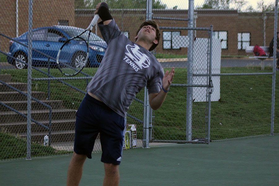 Matt Vandiver, a senior who will be a key player on this years team, serves the ball during a match last year. 