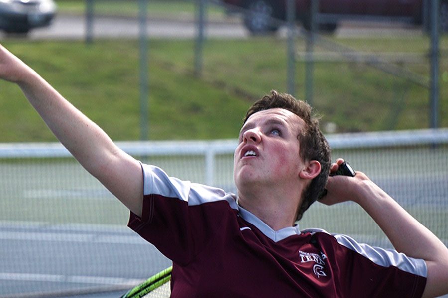 On the first day of the Howell doubles tournament, Alex Schrautemeier serves to the opposing team. He and his brother eventually went on to win third place overall.