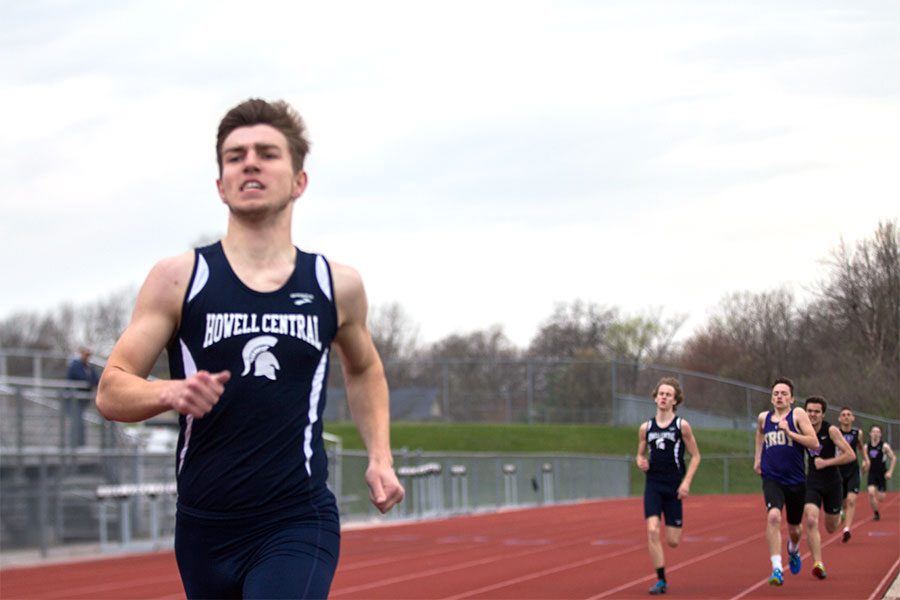 Junior Austin McKinley, sprints the final stretch of the 400m dash. McKinleys newfound affinity for the sport is shared with varsity thrower, senior Quentin Webert