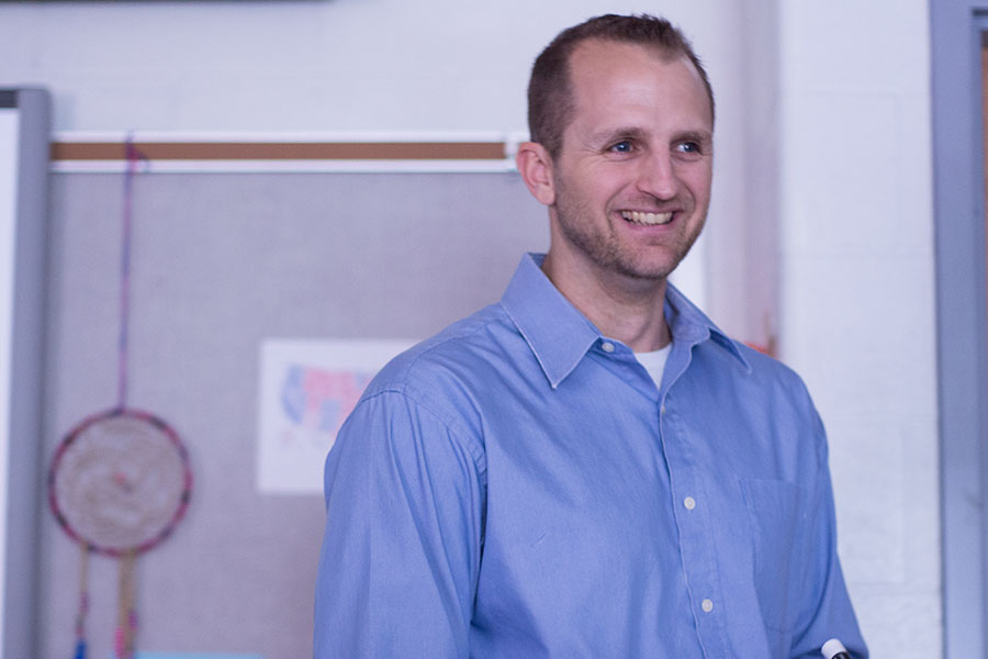 Mr. Beckmann smiles as he tells a joke to his class. He teaches both AP Government and Contemporary Issues. 