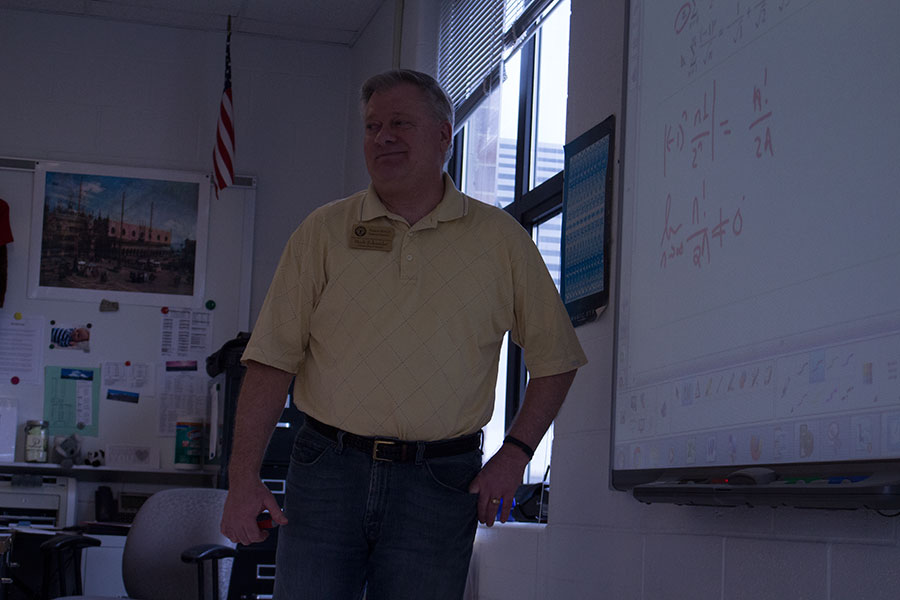 Mr. Shcneider grins as he lectures during class. He teaches AP Statistics and AP Calculus. 