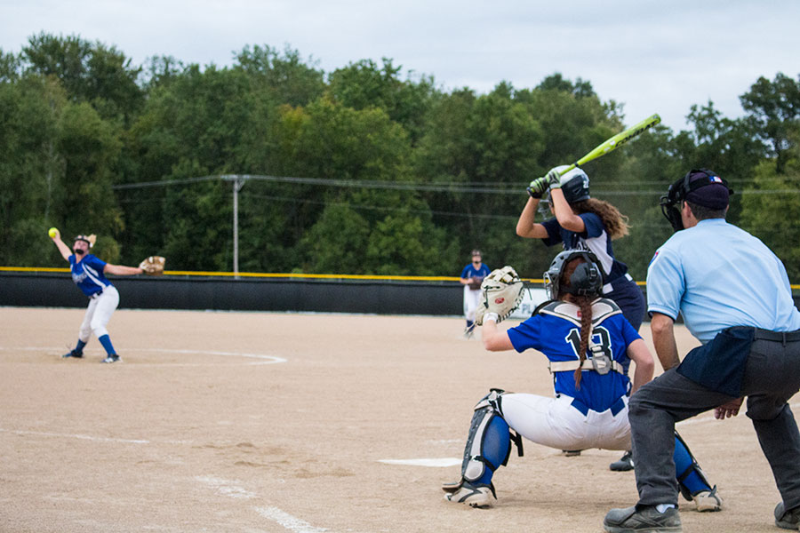 Liz+Harmon%2C+senior%2C+prepares+to+receive+an+oncoming+pitch.+Harmon%2C+as+well+as+senior+Kaitlyn+Chadwick%2C+have+won+games+for+the+team+with+high+RBIs+throughout+the+season.