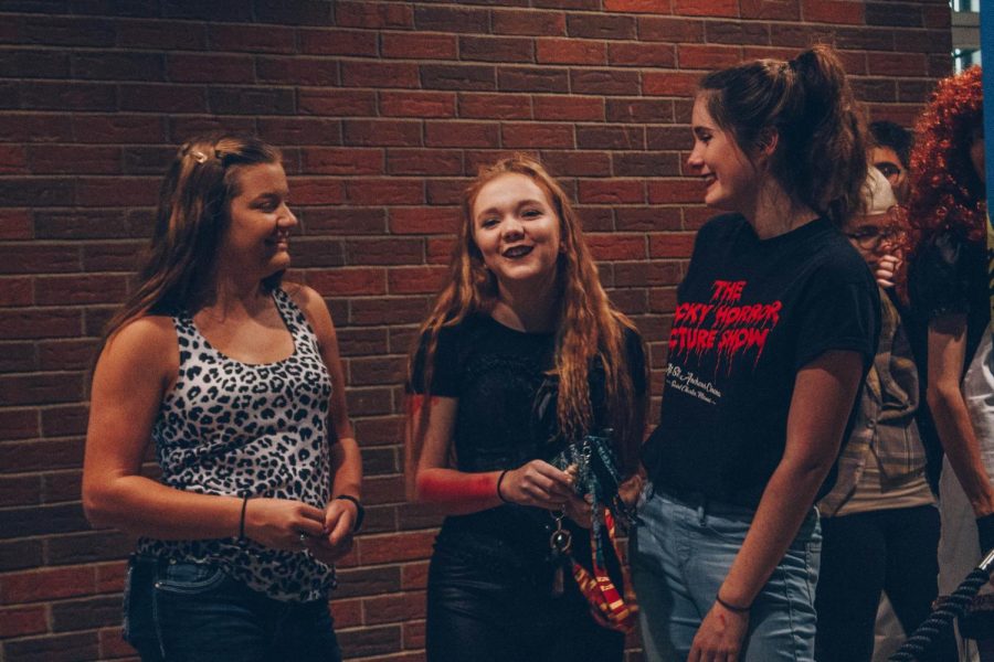 Kelly Weulling, Savannah Womack and Shelly Murrey waiting in line of the St Andrews Theater to see Rocky horror. They have been to Rocky Horror many times and it will never be the last they do.