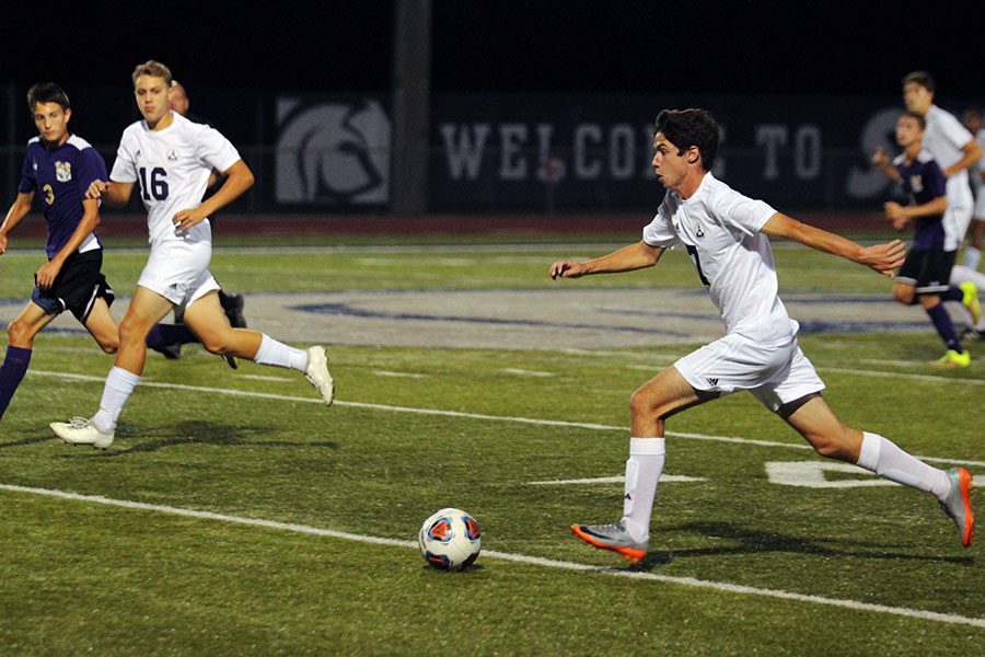 Players prepare to score against Troy