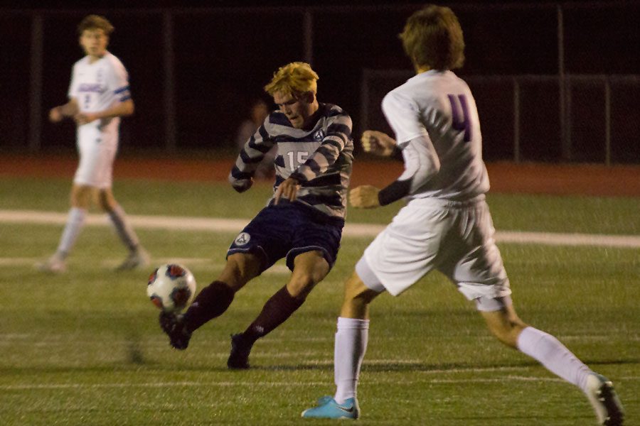 Joey Mueller takes a shot during the playoff game against Zumwalt West.