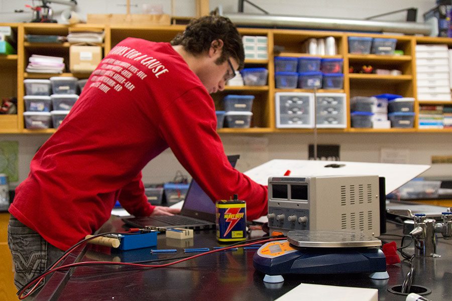 Zach Miller, senior, works in the lab for his AP Physics II class. His course is the highest level of physics available, and he uses it to pursue a future in the field.