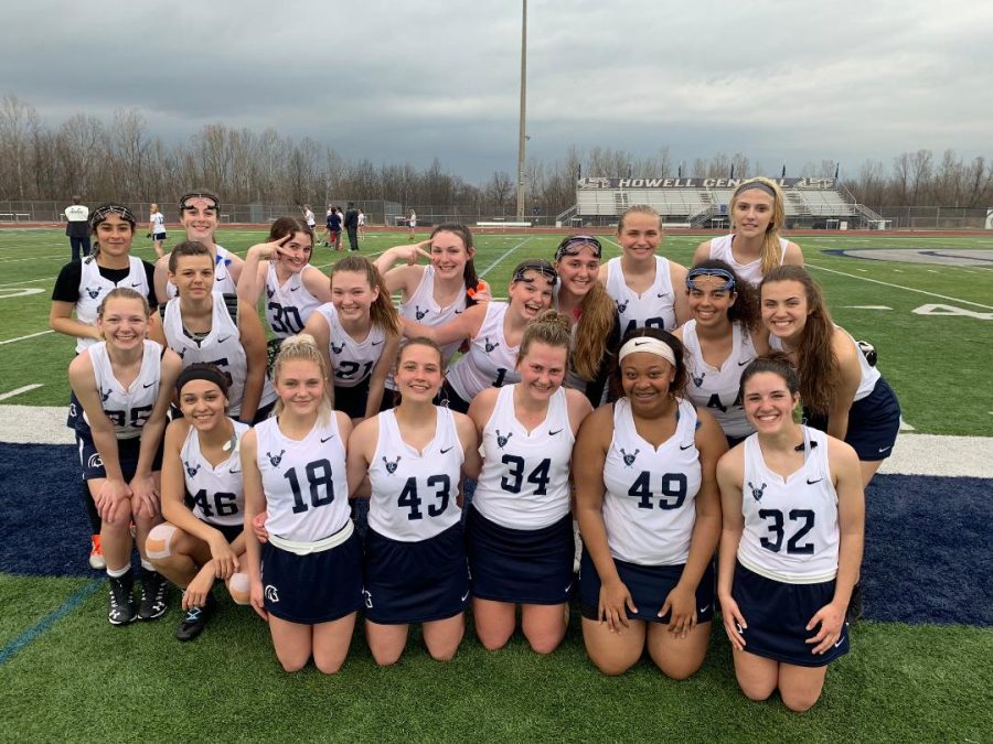 After varsitys game against Northwest on Friday, March 29, the programs official twitter page posted this team photo. The caption read Varsity picks up a hard fought TEAM victory over Northwest 5-1. Way to play as one and HAVE FUN out there. Really proud of you!  #welovetherain
