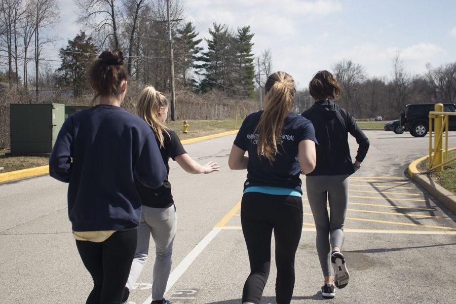 Four members of the track and field team run during practice to prepare their bodies for performance. This is part of what junior Mikayala Aubuchon attributes to their success. 