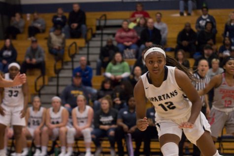 Yaniah Curry is on the move, prepping to catch a pass from a teammate. This is her fourth year on the FHC varsity team, an impressive feat for any player in any sport, and will be attending the University of Toledo in Ohio on a basketball scholarship. 