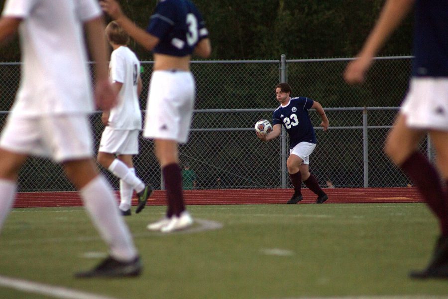Junior Adam Donnell prepares to take a throw in at the FHC vs. Vianney game. Donnell is one of two players on the team that has a long throw which is an advantage to the team. 