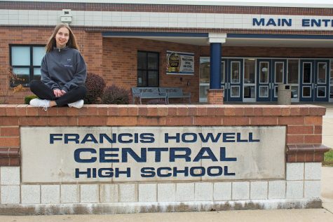 Bojana Kuzmanoska poses in front of Francis Howell Central where she is currently attending high school. The smile on her face displays how happy she is to be in America. 
