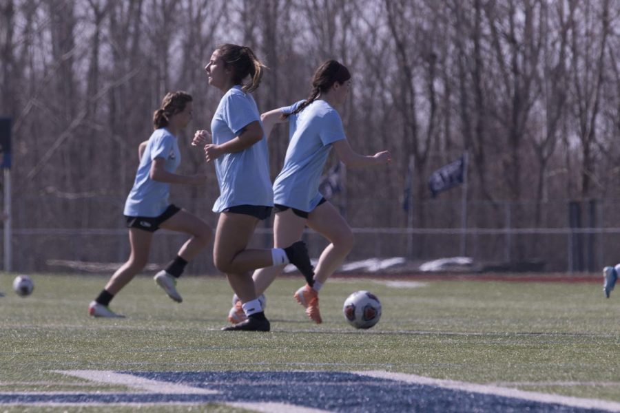 Seniors Kierigan McEvoy and Jay Viola, along with sophomore Jordyn Bailey, practice for girls soccer, one of the 22 MSHSAA sponsored sports offered at FHC. This is one of the 15 sports that make cuts to their programs: thats roughly 68.2 percent of them.