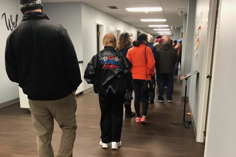 Voters line up in Missouri to fill out election ballots. As elections brought about a rise in tension, people were eager to express their opinions and rights to voting. 