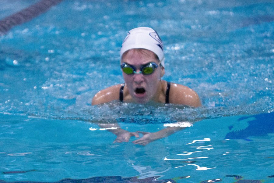 Kayleigh Wright swimming breaststroke.