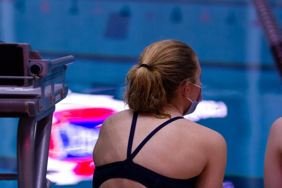 Lianna Durbin watches the divers compete. 