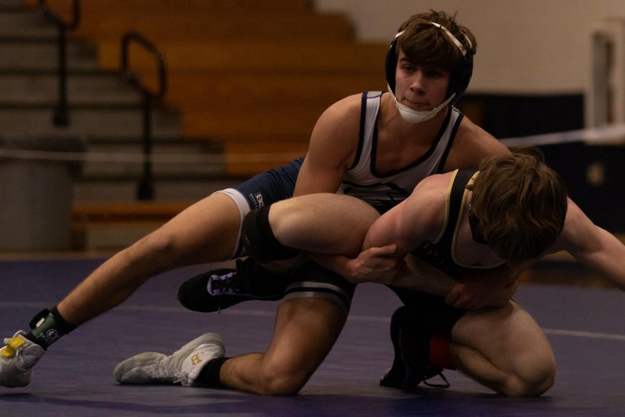 Sophomore Peyton Shepard attempts to work a tilt on a difficult opponent. 