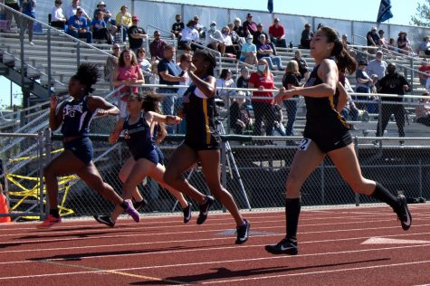 Senior Monica Anderson surges ahead in her sprint at GACs.