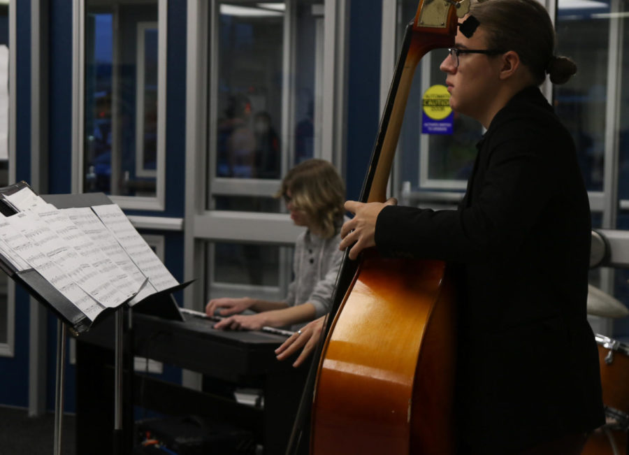Senior Tyler Kropp focuses on playing the cello.