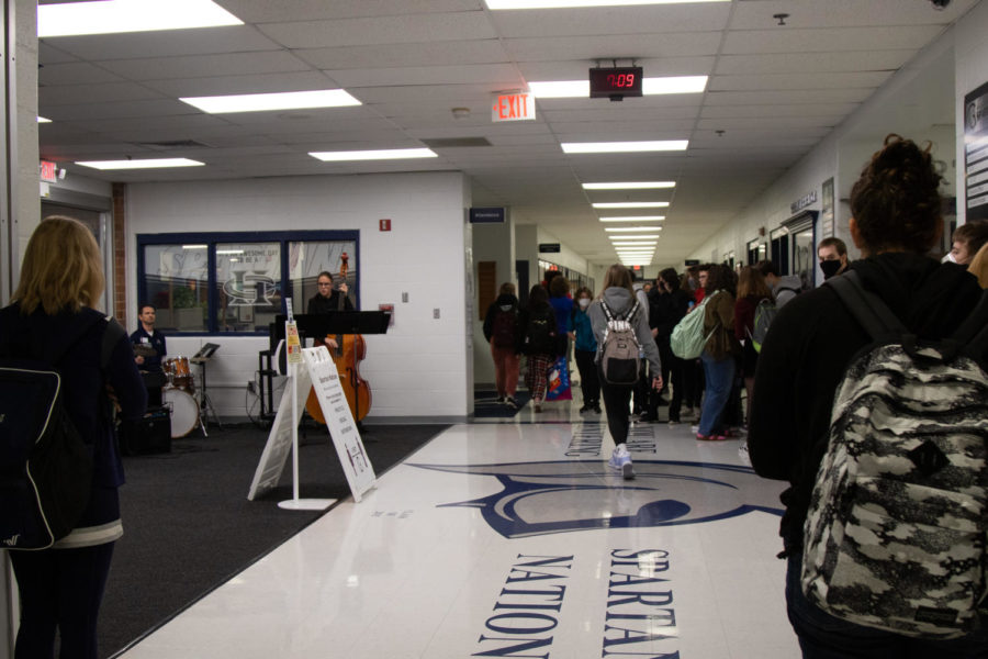 Students gather in the hallway to listen to the bands music.