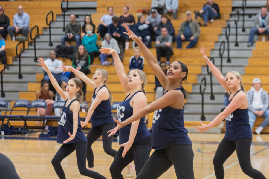 The Varsity Sensations perform their lyrical piece during halftime of the basketball game.