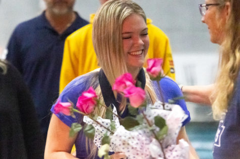 Senior Keaton Frye gives her famous warm smile as she accepts her gift bag. 