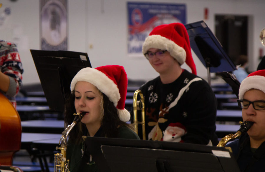 Senior Tyler Piedmont and Junior Chloe Anderson play their instruments.