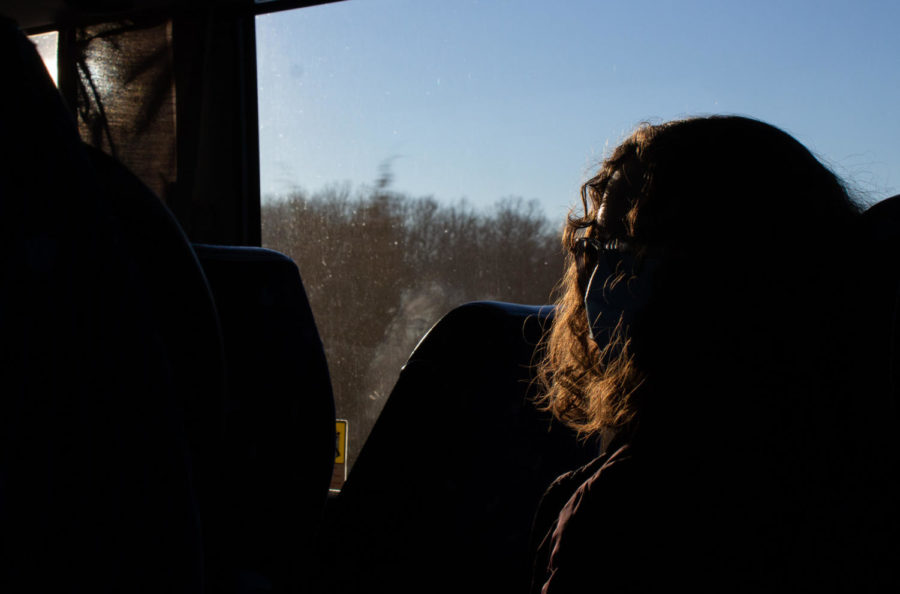 Senior Brianna Dick looks out the window on the bus to Tan-Tar-A.
