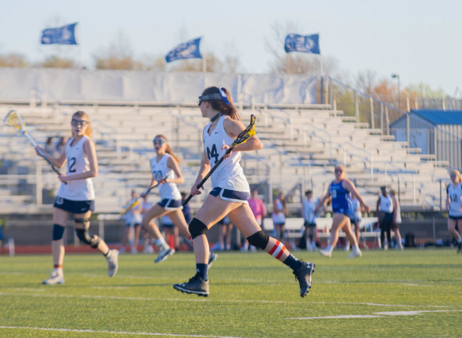 Senior Jenna Wood runs down the field.