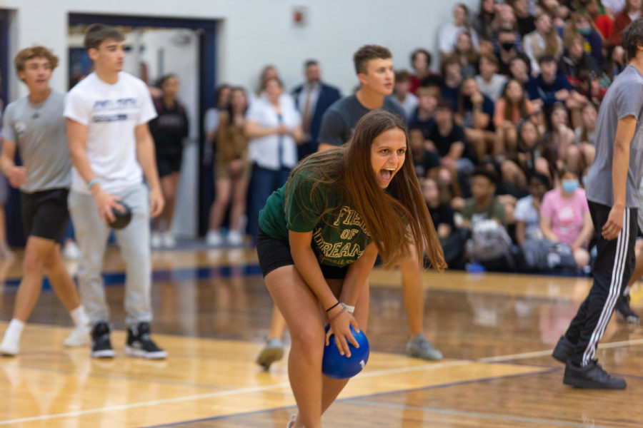 Lexi Floyd, senior, catching a ball in a game of dodgeball.
