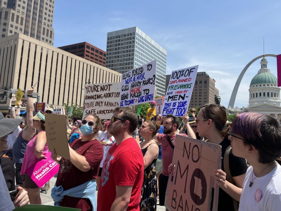 Protesters+march+in+front+of+the+St.+Louis+Arch+during+the+protest+in+Kenner+Plaza+on+May+14%2C+2022.+They+were+there+protesting+against+the+possibility+of+the+Supreme+Court+case+Roe+v.+Wade+being+overturned+after+documents+with+a+potential+court+decision+were+leaked+to+the+public+on+May+3.
