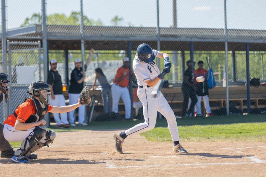 Junior Nick Ortinau swings at a pitch.