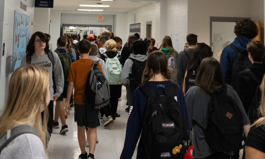 Crowded through the hallway, students rush to the busses after school. Post school release is a chaotic time of day for most students.