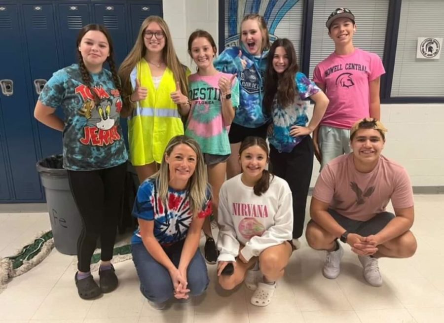 Students and staff pose for the camera, showcasing their school spirit.