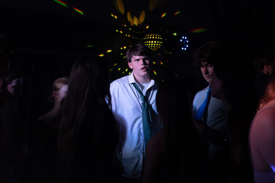 Noah Garthe looking through the crowd on the dance floor.