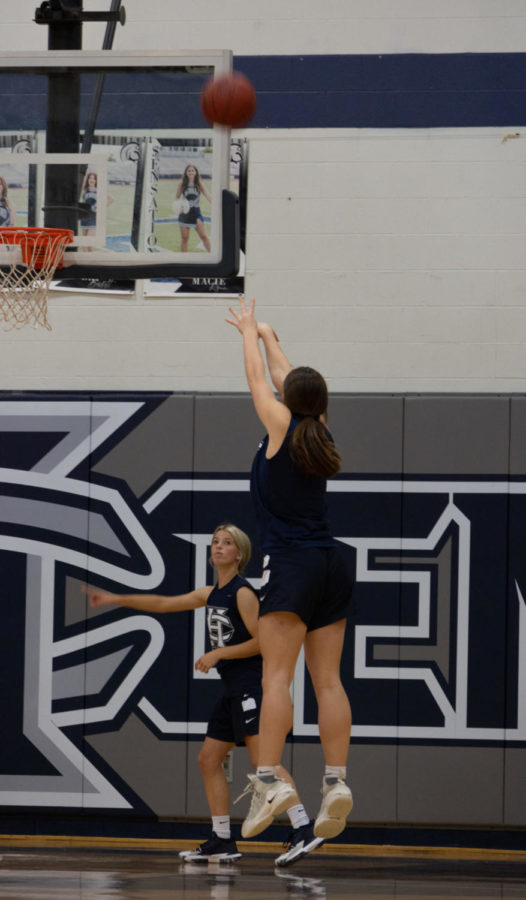 Sophomore Audrey Blaine shoots during the 3 point competition.