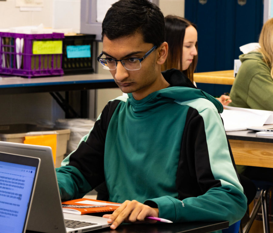 Senior Zain Bari intently focuses on his Medical Interventions assignment.